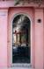 arched entry with ornate gate into a courtyard in downtown Charleston SC